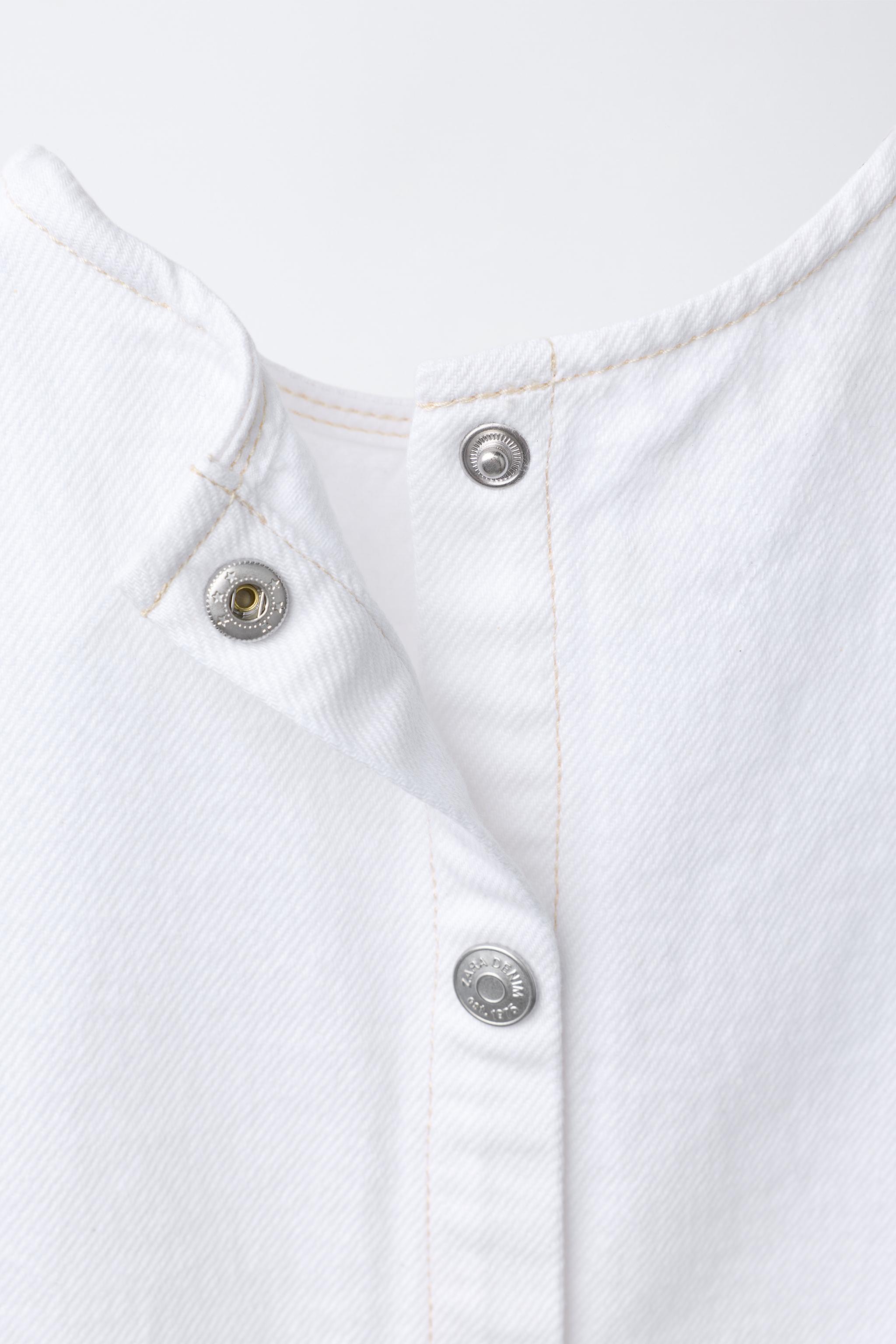 TOP EN DENIM À VOLANTS